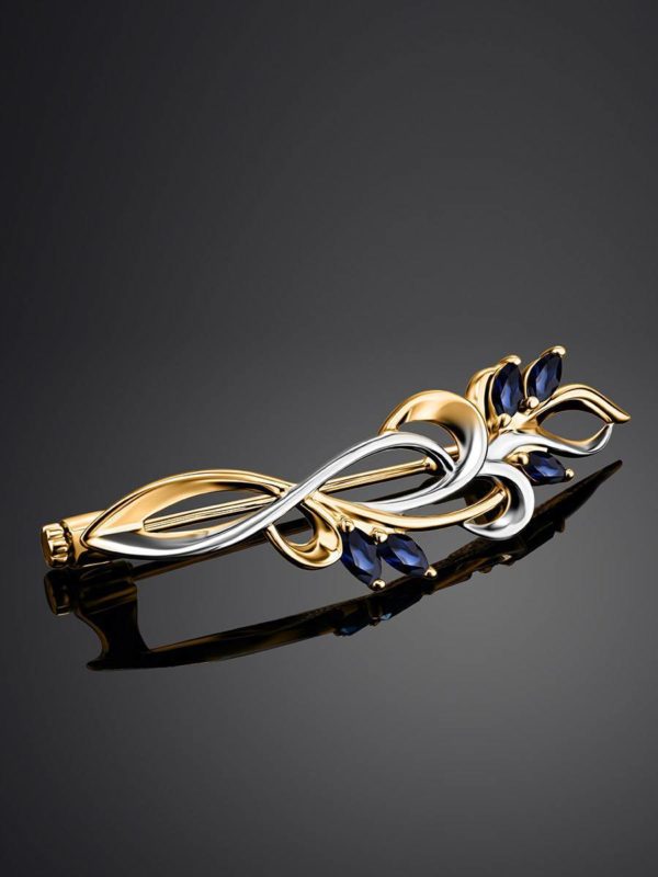 golden brooch with sapphires